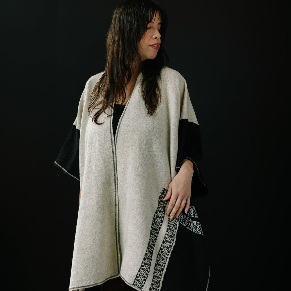 
                      
                        Bicolor White & Black Cape
                      
                    