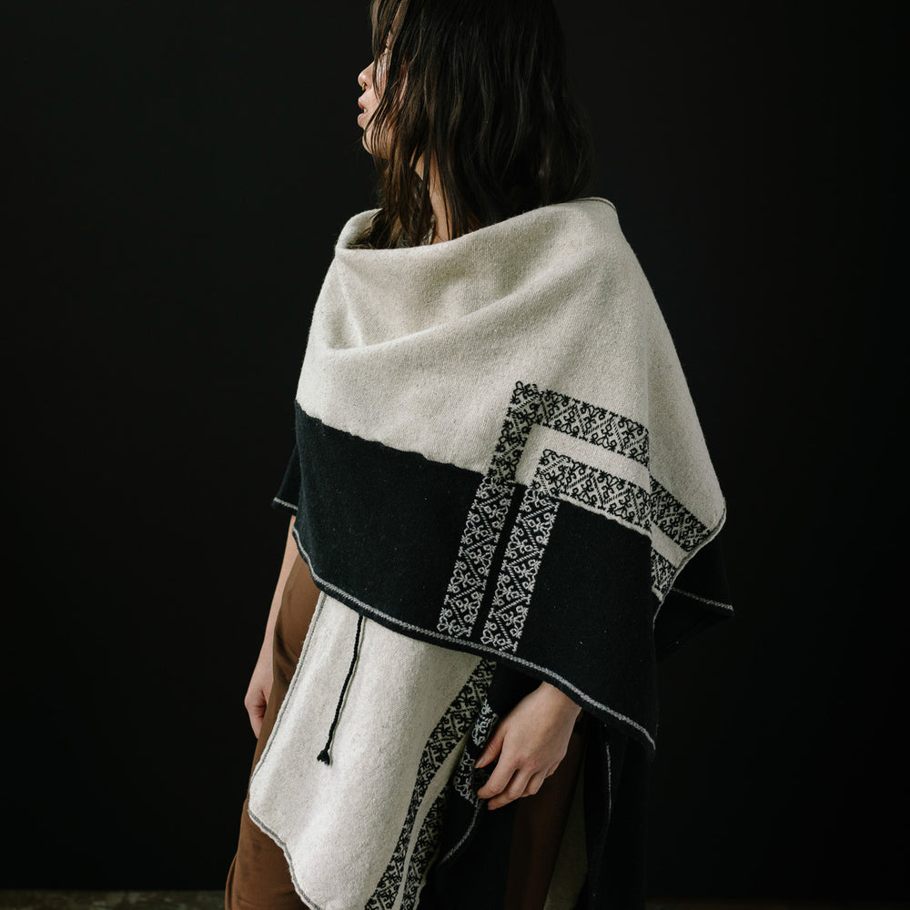 
                      
                        Bicolor White & Black Cape
                      
                    