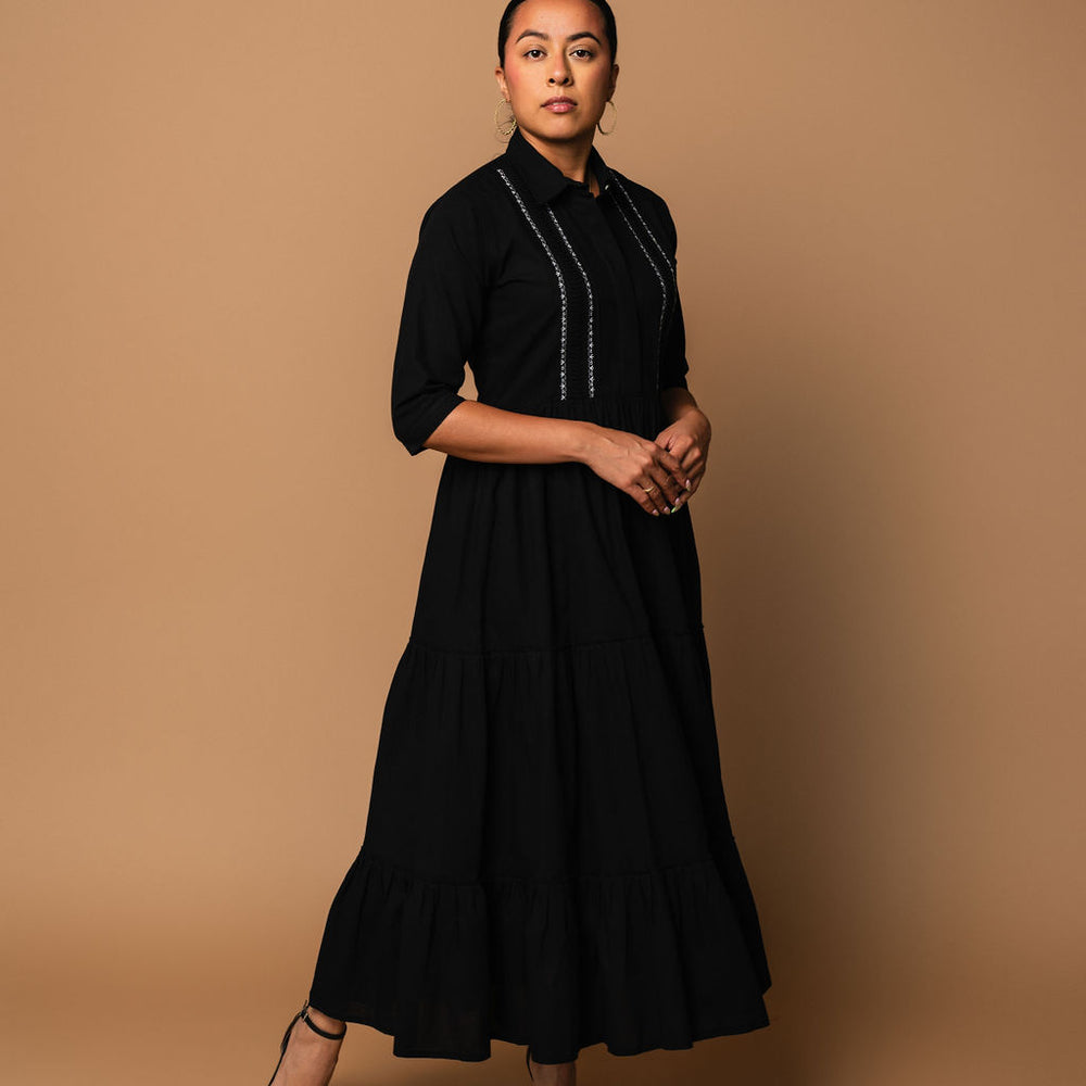 
                      
                        Naila Midi Dress
                      
                    