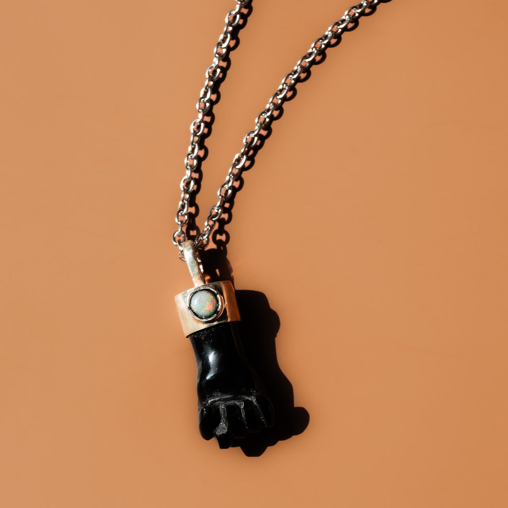 
                      
                        Obsidian & Fire Opal Necklace
                      
                    