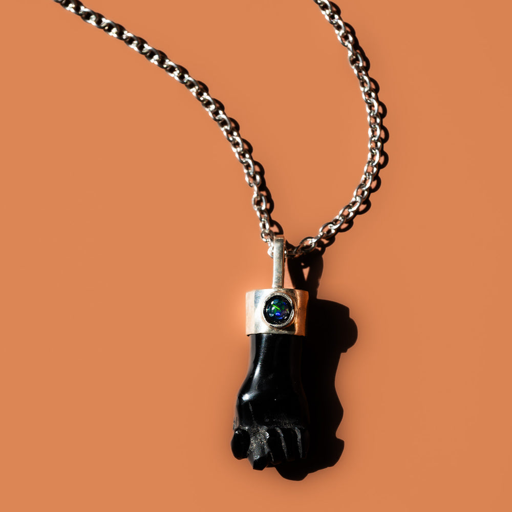 
                      
                        Obsidian & Fire Opal Necklace
                      
                    