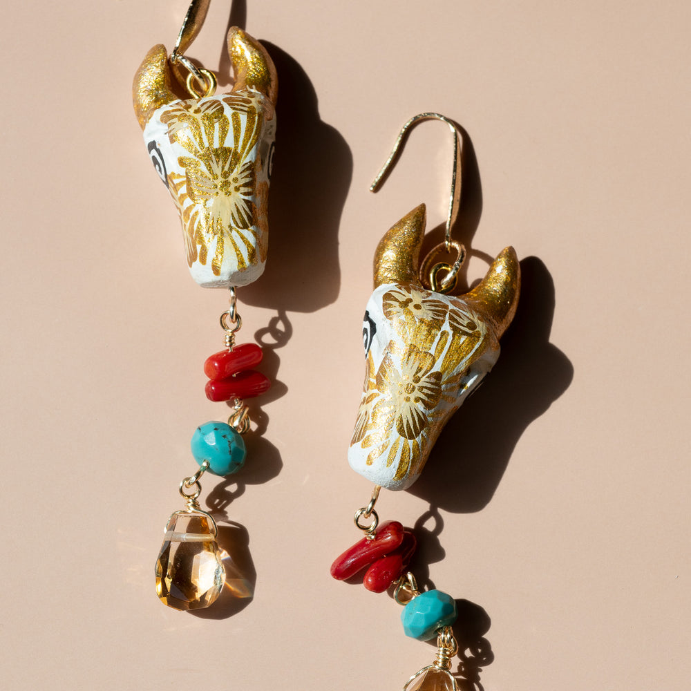 
                      
                        Toro Copal Earrings
                      
                    