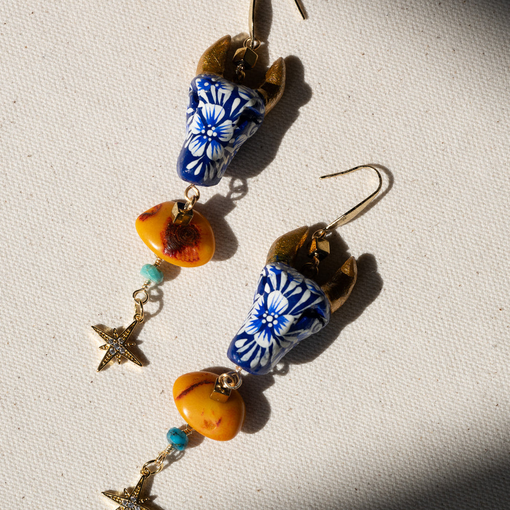 
                      
                        Toro Copal Earrings
                      
                    