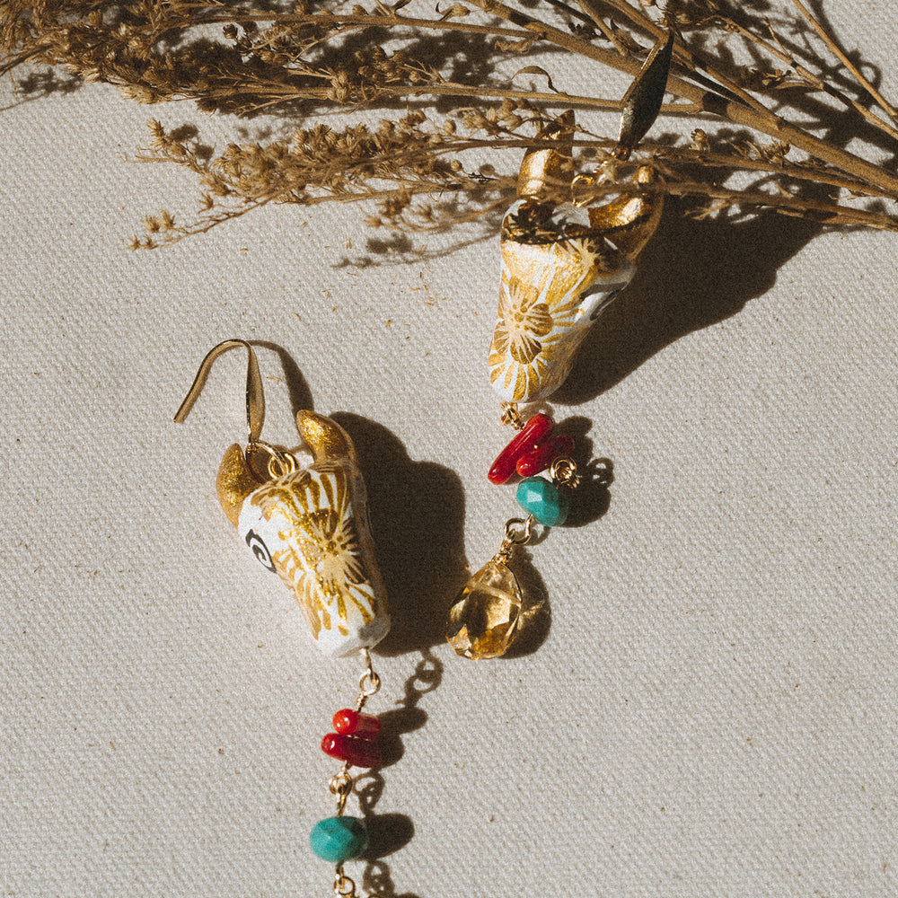 
                      
                        Toro Copal Earrings
                      
                    