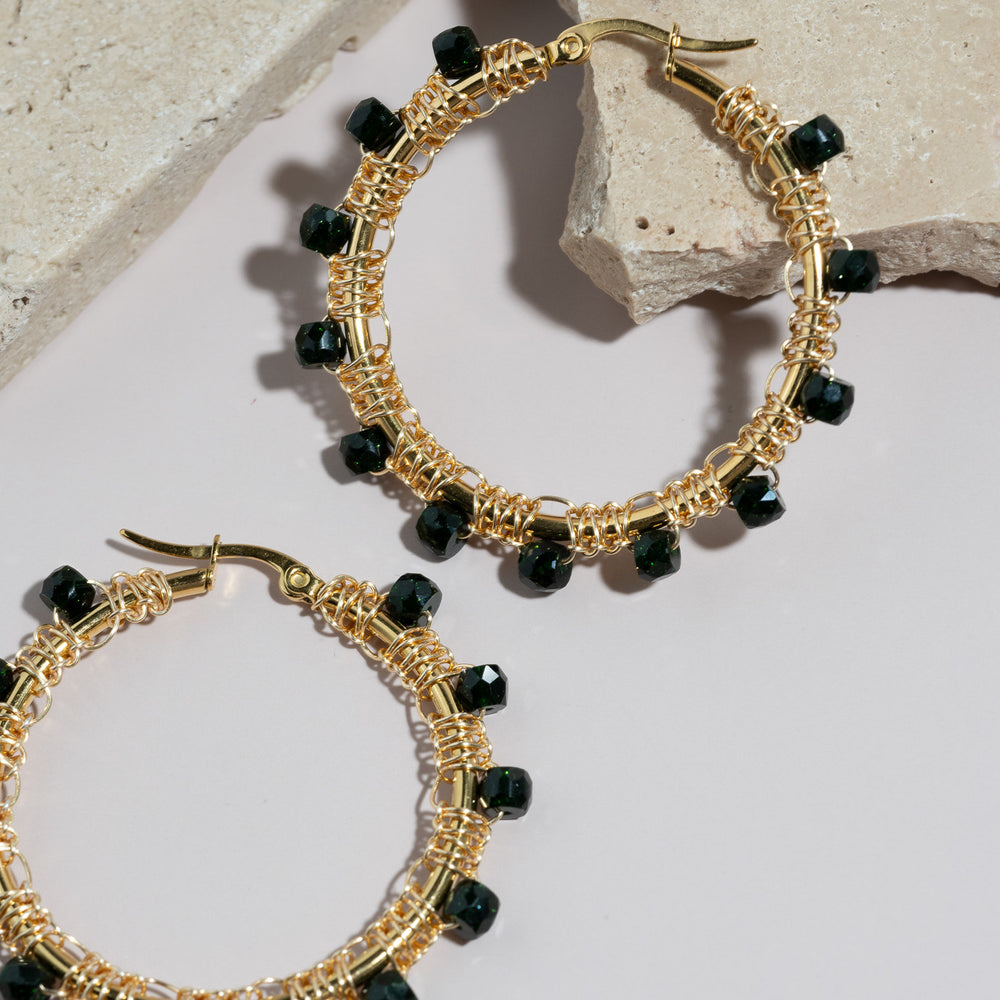 
                      
                        Emerald Hoop Earrings
                      
                    