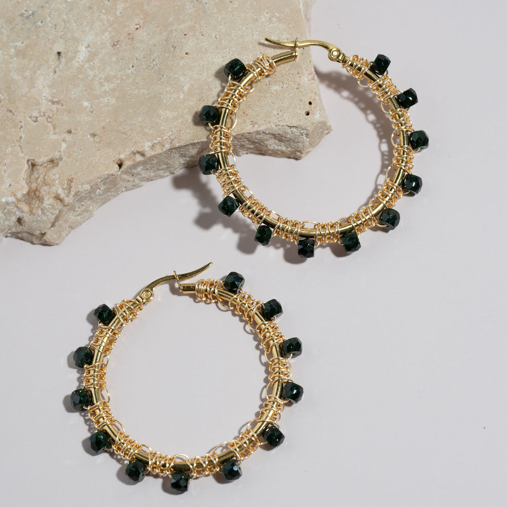 
                      
                        Emerald Hoop Earrings
                      
                    