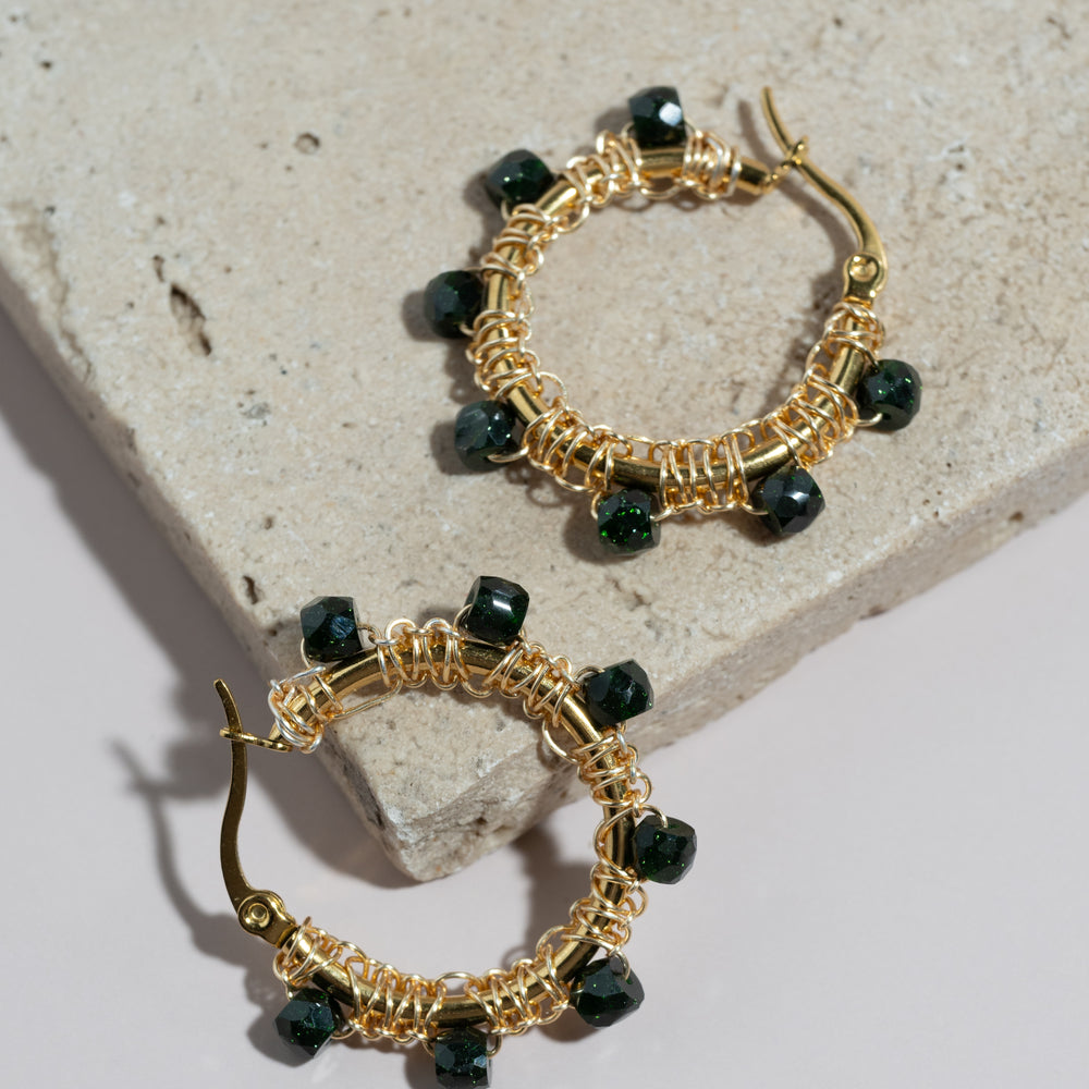 
                      
                        Emerald Hoop Earrings
                      
                    