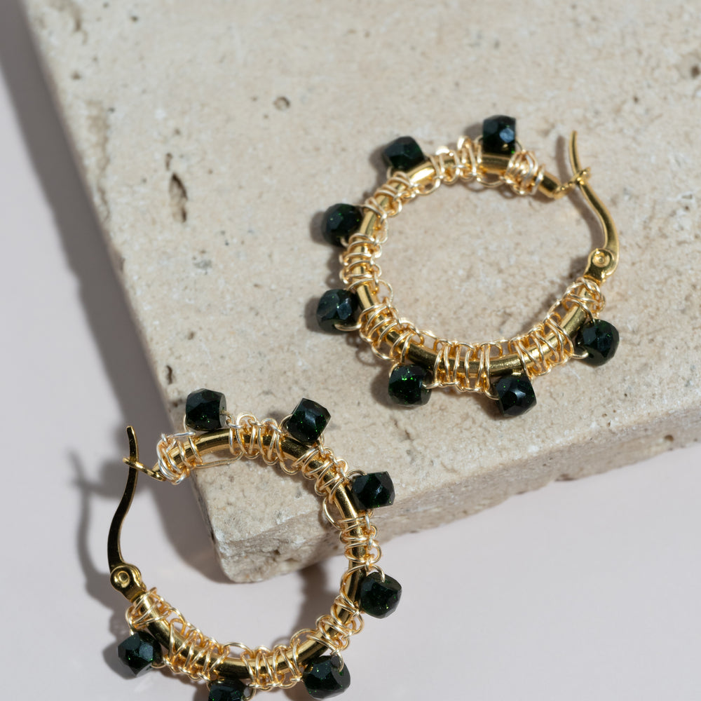 
                      
                        Emerald Hoop Earrings
                      
                    