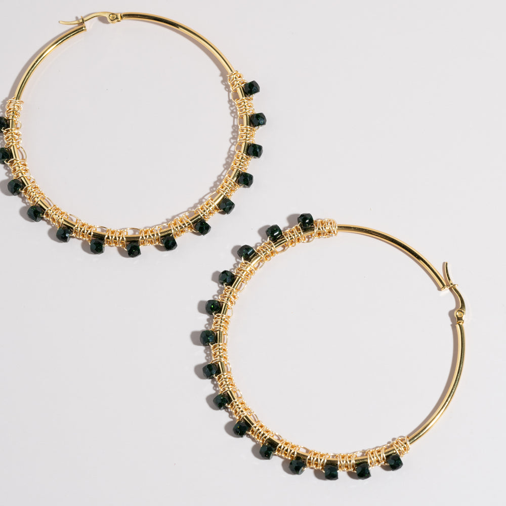 
                      
                        Emerald Hoop Earrings
                      
                    