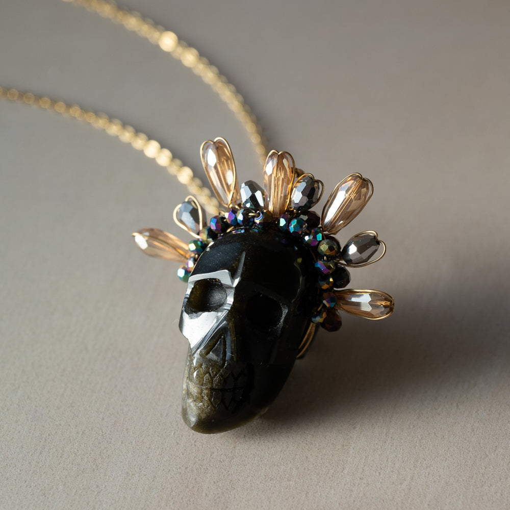 
                      
                        Obsidian Frida Skull Necklace
                      
                    