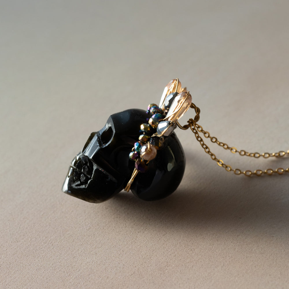 
                      
                        Obsidian Frida Skull Necklace
                      
                    