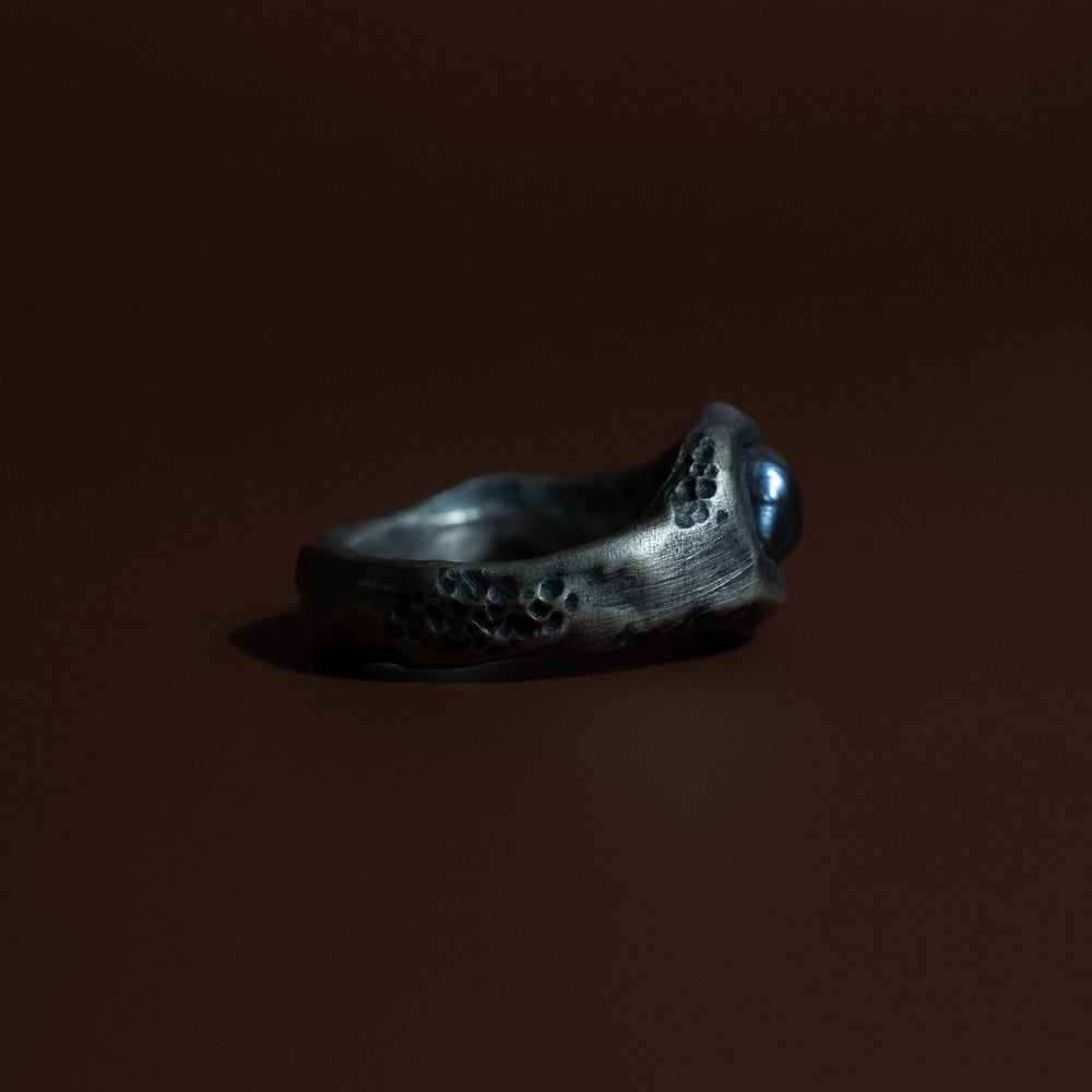 
                      
                        Black Pearl Ring
                      
                    