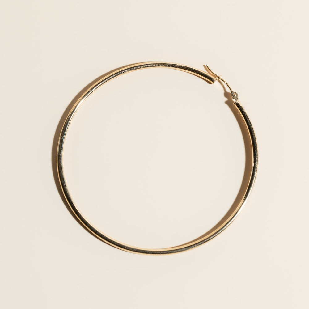 
                      
                        14K Gold Hoops 60mm
                      
                    