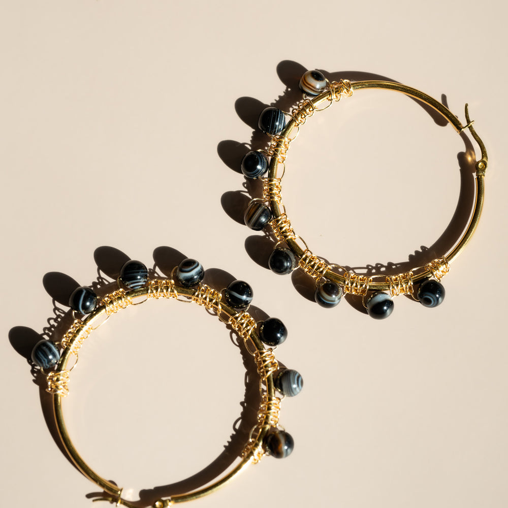 
                      
                        Onyx Hoop Earrings
                      
                    