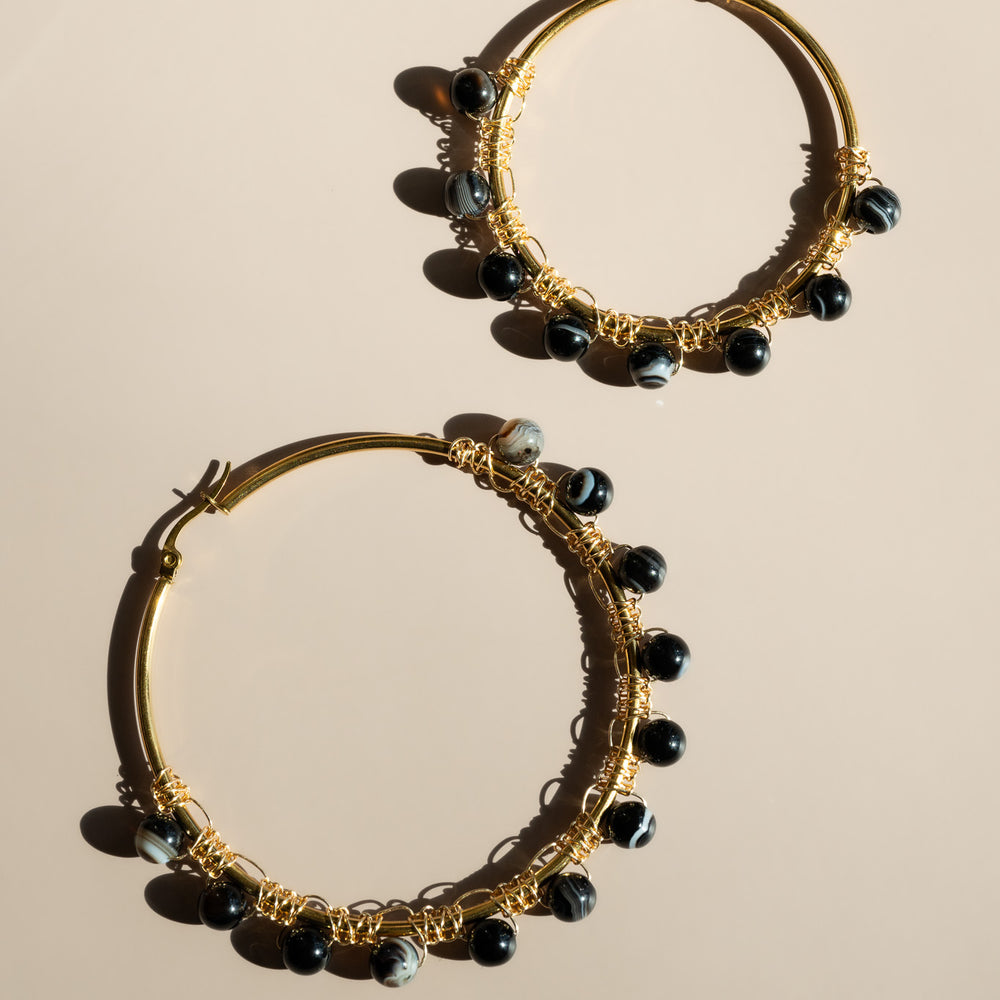 
                      
                        Onyx Hoop Earrings
                      
                    