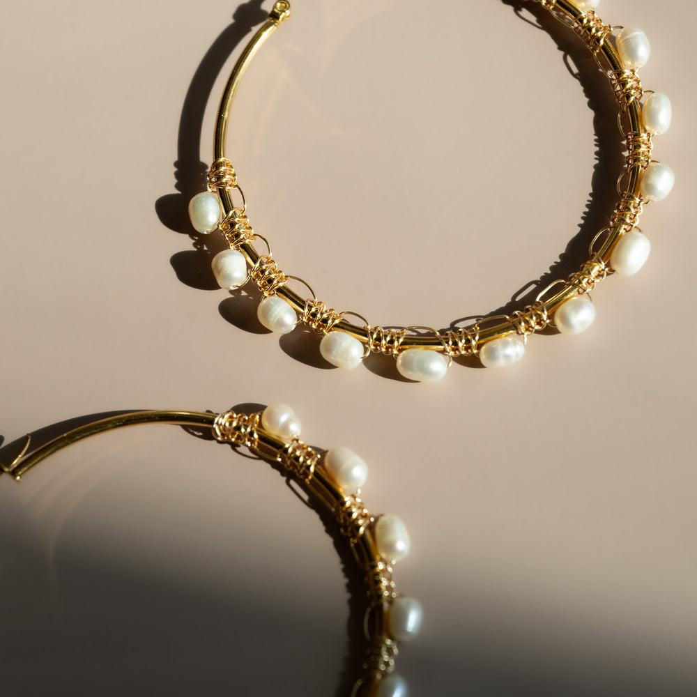 
                      
                        Pearl Hoop Earrings
                      
                    