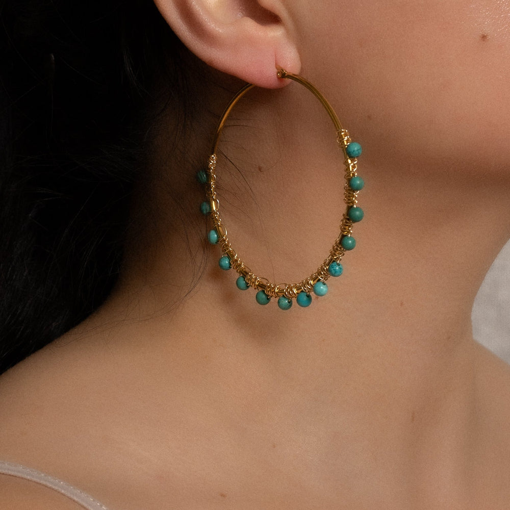 
                      
                        Turquoise Hoop Earrings
                      
                    